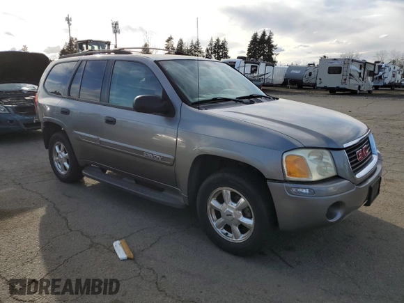 2005 GMC Envoy SLE with VIN 1GKDS13S952104730, listed as a Copart auction lot 47778585 with 187,712 mi miles and Salvage Title. Bid and sale history available at carsss.com. Image 4.