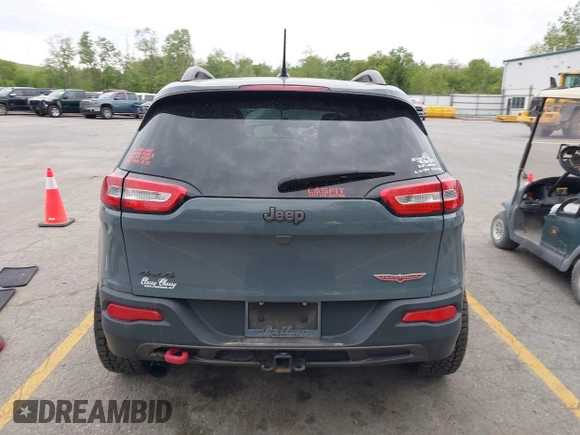 2015 Jeep Cherokee Trailhawk z VIN 1C4PJMBB9FW676566, wystawiony jako IAAI lot #42303335 z przebiegiem 123 026 mil mil oraz . Historia ofert i sprzedaży dostępna na DreamBid. Obrazek 16.