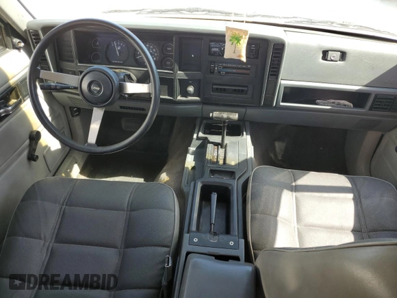 1994 Jeep Cherokee SE with VIN 1J4FT28SXRL151422, listed as a Copart auction lot 77358594 with 74,628 mi miles and Salvage Title. Bid and sale history available at carsss.com. Image 8.