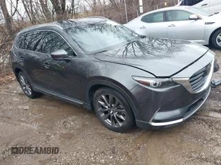 2020 Mazda CX-9 Signature with VIN JM3TCBEY4L0422752, listed as a IAAI auction lot 41207874 with 32,528 mi miles and . Bid and sale history available at carsss.com. Image 1.