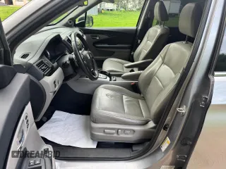 2018 Honda Pilot Touring z VIN 5FNYF6H94JB070661, wystawiony jako Copart lot #60926415 z przebiegiem 205 538 mil mil oraz Czysty tytuł • Clean title. Historia ofert i sprzedaży dostępna na DreamBid. Obrazek 14.
