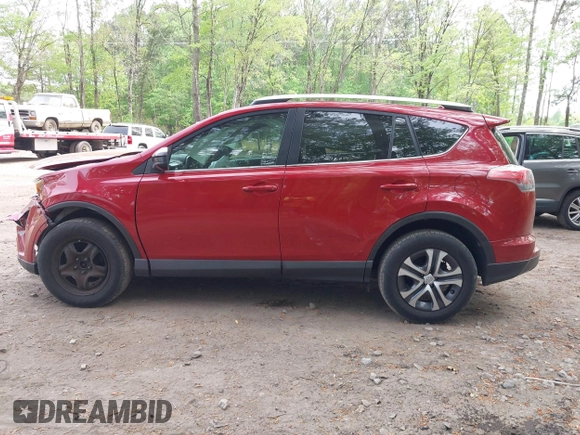 2016 Toyota RAV4 LE with VIN JTMZFREV4GJ062701, listed as a IAAI auction lot 42084694 with 121,553 mi miles and . Bid and sale history available at DreamBid. Image 15.