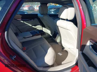 2014 Cadillac XTS Luxury z VIN 2G61N5S34E9163874, wystawiony jako IAAI lot #41649292 z przebiegiem 104 638 mil mil oraz . Historia ofert i sprzedaży dostępna na DreamBid. Obrazek 8.