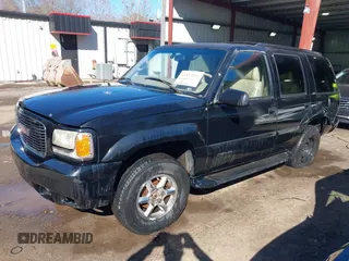2000 GMC Denali with VIN 1GKEK13R1YR129862, listed as a IAAI auction lot 41833054 with 223,811 mi miles. Bid and sale history available at carsss.com. Image 17.