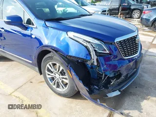 2023 Cadillac XT5 FWD Premium Luxury with VIN 1GYKNCRS4PZ151486, listed as a IAAI auction lot 42099826 with 42,274 mi miles and . Bid and sale history available at DreamBid. Image 6.