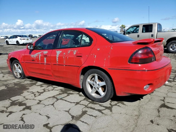 1999 Pontiac Grand Am GT1 with VIN 1G2NW52E5XM768638, listed as a Copart auction lot 49077115 with NaN miles and Salvage Title. Bid and sale history available at carsss.com. Image 2.