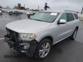 2013 Dodge Durango Crew z VIN 1C4RDJDGXDC637572, wystawiony jako IAAI lot #41922757 z przebiegiem 110 941 mil mil oraz . Historia ofert i sprzedaży dostępna na DreamBid. Obrazek 19.