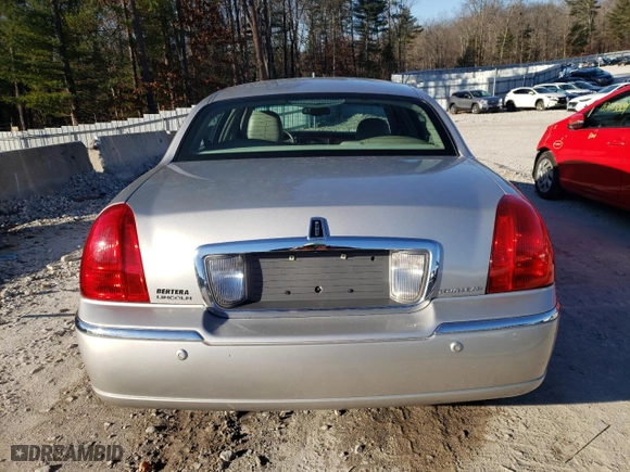 2003 Lincoln Town Car Cartier with VIN 1LNHM83W63Y692465, listed as a Copart auction lot 84882984 with 106,405 mi miles and Clean Title. Bid and sale history available at carsss.com. Image 6.