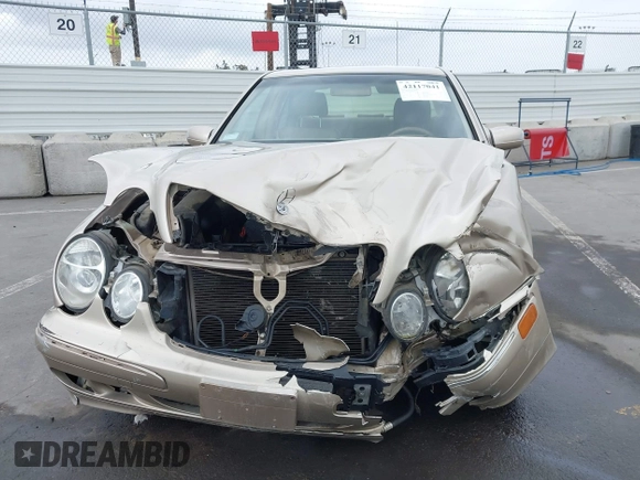 2001 Mercedes-Benz E 320 z VIN WDBJF65J71B245423, wystawiony jako IAAI lot #42117041 z przebiegiem 143 885 mil mil oraz . Historia ofert i sprzedaży dostępna na DreamBid. Obrazek 13.