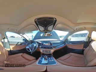 2020 BMW 7 Series with VIN WBA7W4C06LBM70555, listed as a Copart auction lot 52126455 with 37,375 mi miles and Salvage title. Bid and sale history available at DreamBid. Image 13.