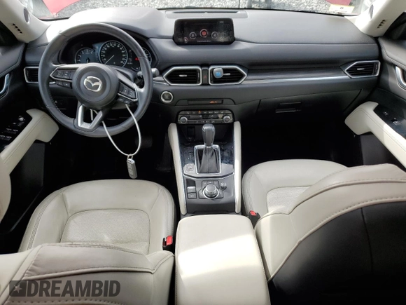 2019 Mazda CX-5 Grand Touring with VIN JM3KFBDM1K0559891, listed as a Copart auction lot 58775275 with 45,126 mi miles and Salvage title. Bid and sale history available at DreamBid. Image 8.