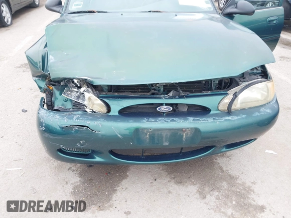 1999 Ford Escort LX z VIN 1FAFP10P1XW230023, wystawiony jako IAAI lot #42486934 z przebiegiem 41 468 mil mil oraz . Historia ofert i sprzedaży dostępna na DreamBid. Obrazek 6.