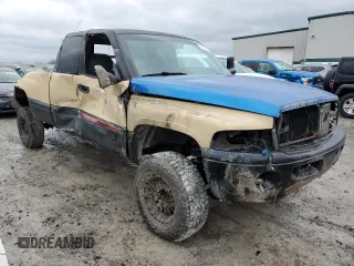 1999 Dodge Ram 2500 with VIN 1B7KF2364XJ606005, listed as a Copart auction lot 84309184 with 0 mi miles and Salvage Title. Bid and sale history available at carsss.com. Image 4.