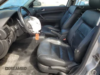 2003 Volkswagen Passat GLS z VIN WVWPD63BX3P100430, wystawiony jako Copart lot #70912634 z przebiegiem 129 933 mil mil oraz Szkoda całkowita • Salvage title. Historia ofert i sprzedaży dostępna na DreamBid. Obrazek 7.