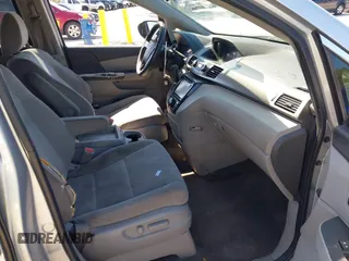 2015 Honda Odyssey EX with VIN 5FNRL5H46FB032366, listed as a IAAI auction lot 42034443 with 154,679 mi miles and . Bid and sale history available at carsss.com. Image 5.