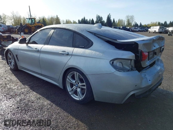 2016 BMW 4 Series 428i xDrive with VIN WBA4C9C5XGG135893, listed as a IAAI auction lot 41976541 with 86,987 mi miles and . Bid and sale history available at carsss.com. Image 3.