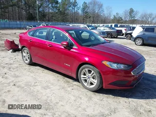 2018 Ford Fusion Hybrid SE with VIN 3FA6P0LU1JR243022, listed as a IAAI auction lot 41470052 with 119,636 mi miles. Bid and sale history available at carsss.com. Image 1.