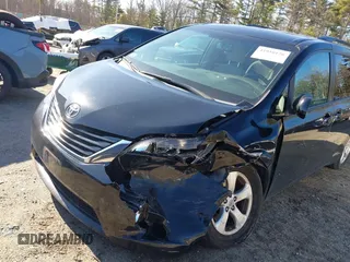 2015 Toyota Sienna LE AAS with VIN 5TDKK3DCXFS594370, listed as a IAAI auction lot 41910126 with 131,638 mi miles. Bid and sale history available at carsss.com. Image 6.