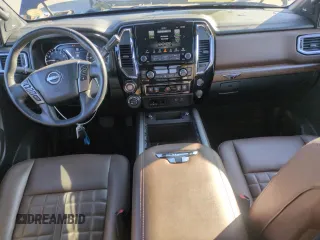 2023 Nissan Titan Pro-4X с VIN 1N6AA1ED0PN103058, выставлен на аукционе Copart как лот 49266895 с пробегом 47 145 миль миль и Списание • Salvage title. История ставок и продаж доступна на DreamBid. Изображение 8.