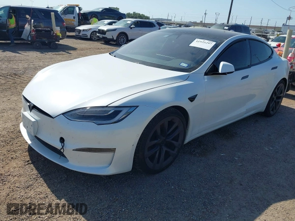 2022 Tesla Model S z VIN 5YJSA1E59NF470813, wystawiony jako IAAI lot #41935297 z przebiegiem Nie podano mil oraz . Historia ofert i sprzedaży dostępna na DreamBid. Obrazek 2.