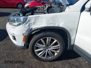 2013 Volkswagen Tiguan SE with VIN WVGBV7AX7DW511699, listed as a IAAI auction lot 41970908 with 164,758 mi miles and . Bid and sale history available at DreamBid. Image 6.