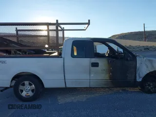 2007 Ford F-150 STX with VIN 1FTRX14W57KC44619, listed as a IAAI auction lot 41402821 with Not provided miles and . Bid and sale history available at DreamBid. Image 12.
