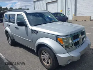 2011 Dodge Nitro SE with VIN 1D4PU2GKXBW508467, listed as a IAAI auction lot 42061484 with 100,295 mi miles. Bid and sale history available at carsss.com. Image 1.