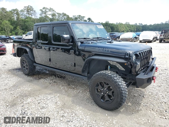 2023 Jeep Gladiator Sport S with VIN 1C6HJTAG9PL525183, listed as a Copart auction lot 54556735 with 13,805 mi miles and Salvage title. Bid and sale history available at DreamBid. Image 4.