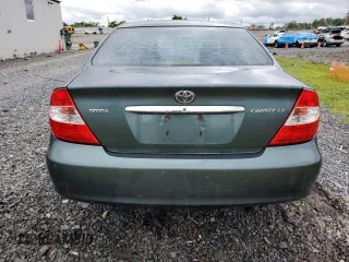 2004 Toyota Camry LE with VIN 4T1BE32K44U283796, listed as a Copart auction lot 58487755 with 131,323 mi miles and Salvage title. Bid and sale history available at DreamBid. Image 6.