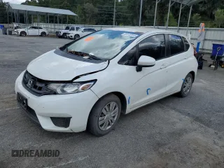 2015 Honda Fit LX with VIN 3HGGK5G51FM732281, listed as a Copart auction lot 69142314 with 112,853 mi miles and Salvage title. Bid and sale history available at DreamBid. Image 1.