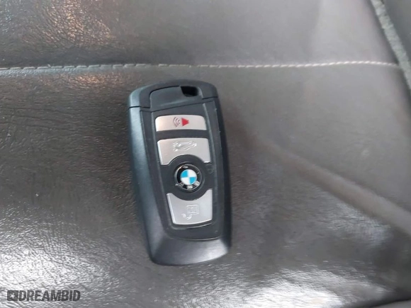 2015 BMW 5 Series 535i xDrive with VIN WBA5B3C55FD548566, listed as a IAAI auction lot 38795042 with 67,985 mi miles. Bid and sale history available at carsss.com. Image 11.