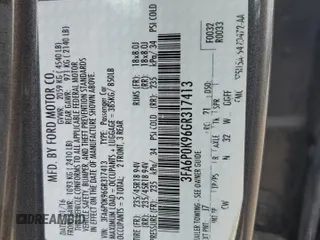 2016 Ford Fusion Titanium with VIN 3FA6P0K96GR317413, listed as a Copart auction lot 61256585 with 91,915 mi miles and Salvage title. Bid and sale history available at DreamBid. Image 13.
