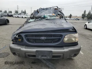 1999 Ford Explorer XLT with VIN 1FMZU34E6XZC14009, listed as a Copart auction lot 55251525 with 253,681 mi miles and Salvage title. Bid and sale history available at DreamBid. Image 5.