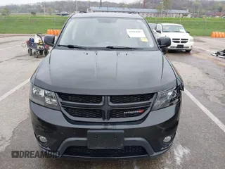 2013 Dodge Journey SXT with VIN 3C4PDDBG4DT660474, listed as a IAAI auction lot 41984607 with 124,926 mi miles and . Bid and sale history available at DreamBid. Image 13.