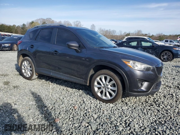 2014 Mazda CX-5 Grand Touring with VIN JM3KE2DY4E0323603, listed as a Copart auction lot 49884835 with 0 mi miles and Salvage Title. Bid and sale history available at carsss.com. Image 4.