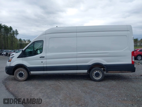 2022 Ford Transit Cargo with VIN 1FTBR3X85NKA74408, listed as a IAAI auction lot 42150248 with 88,887 mi miles and . Bid and sale history available at DreamBid. Image 14.