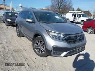 2020 Honda CR-V Touring with VIN 2HKRW2H92LH608050, listed as a IAAI auction lot 41431224 with 52,678 mi miles and . Bid and sale history available at DreamBid. Image 1.