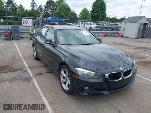 2012 BMW 3 Series 328i with VIN WBA3A5G51CNP17522, listed as a IAAI auction lot 42124868 with 154,385 mi miles and . Bid and sale history available at carsss.com. Image 1.