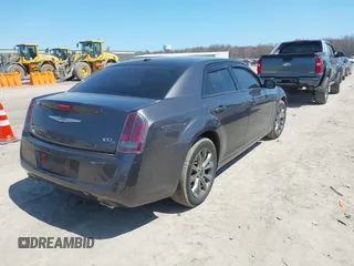 2014 Chrysler 300 with VIN 2C3CCAGG2EH384383, listed as a IAAI auction lot 42044047 with 114,271 mi miles. Bid and sale history available at carsss.com. Image 4.