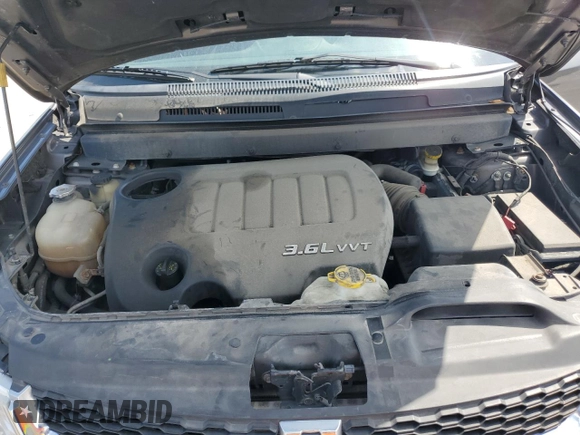 2014 Dodge Journey SXT with VIN 3C4PDCBG8ET140984, listed as a Copart auction lot 54408445 with 135,290 mi miles and Salvage Title. Bid and sale history available at DreamBid. Image 12.