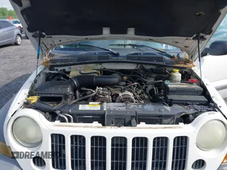 2005 Jeep Liberty Sport z VIN 1J4GK48K75W530535, wystawiony jako IAAI lot #42154934 z przebiegiem 132 637 mil mil oraz . Historia ofert i sprzedaży dostępna na DreamBid. Obrazek 10.