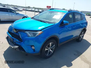 2018 Toyota RAV4 XLE with VIN JTMWFREV2JJ168557, listed as a IAAI auction lot 41994837 with 107,636 mi miles. Bid and sale history available at carsss.com. Image 18.