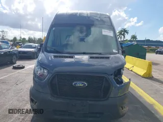 2021 Ford Transit Cargo with VIN 1FTBR3X89MKA54791, listed as a IAAI auction lot 42515449 with 57,847 mi miles and . Bid and sale history available at DreamBid. Image 12.