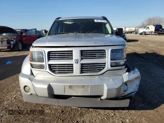 2010 Dodge Nitro SXT z VIN 1D4PT5GK5AW106990, wystawiony jako Copart lot #88719415 z przebiegiem 193 019 mil mil oraz Szkoda całkowita • Salvage title. Historia ofert i sprzedaży dostępna na DreamBid. Obrazek 5.