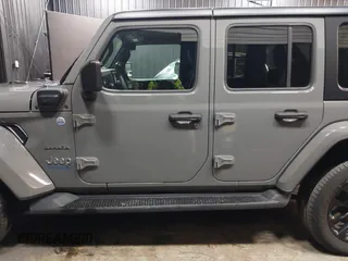 2022 Jeep Wrangler Unlimited Sahara with VIN 1C4JJXP66NW198723, listed as a IAAI auction lot 41368728 with 31,814 mi miles and . Bid and sale history available at DreamBid. Image 14.