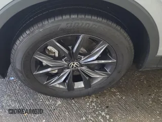 2024 Volkswagen Tiguan SE with VIN 3VV3B7AX5RM107374, listed as a IAAI auction lot 42845196 with 24,195 mi miles and . Bid and sale history available at DreamBid. Image 2.