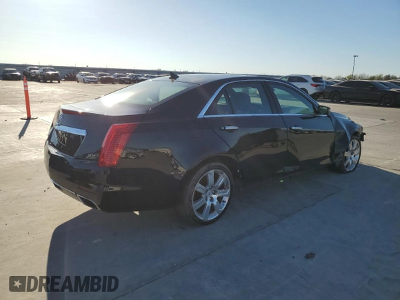2014 Cadillac CTS Premium AWD with VIN 1G6AZ5S31E0130572, listed as a Copart auction lot 50060845 with 72,335 mi miles and Salvage Title. Bid and sale history available at DreamBid. Image 3.