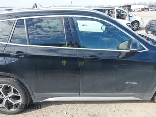 2016 BMW X1 xDrive28i with VIN WBXHT3Z3XG4A48557, listed as a IAAI auction lot 41387960 with 84,821 mi miles. Bid and sale history available at carsss.com. Image 13.