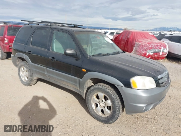 2001 Mazda Tribute LX with VIN 4F2CU08191KM27990, listed as a IAAI auction lot 41487001 with 209,394 mi miles and . Bid and sale history available at carsss.com. Image 1.