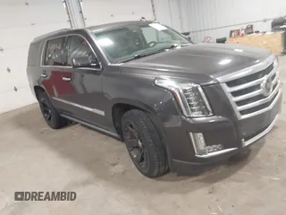 2015 Cadillac Escalade Premium z VIN 1GYS4CKJ8FR308617, wystawiony jako IAAI lot #41974608 z przebiegiem 154 014 mil mil oraz . Historia ofert i sprzedaży dostępna na DreamBid. Obrazek 1.